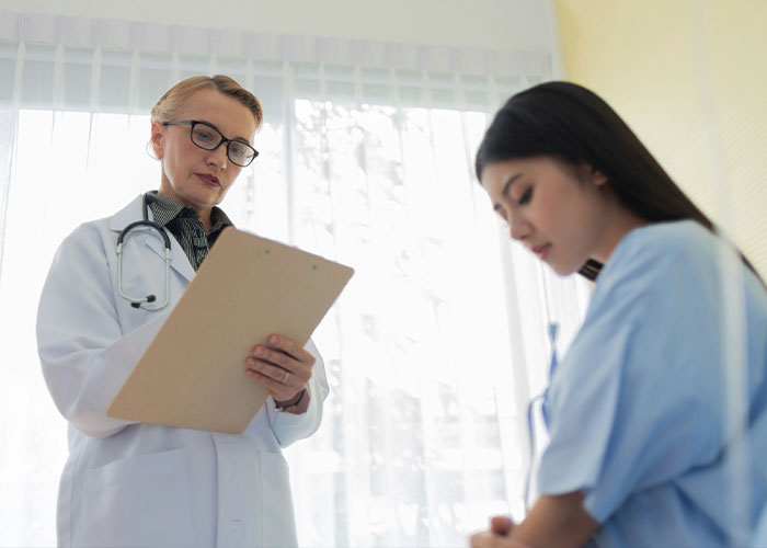 A doctor consults with a patient about cosmetic surgery, highlighting dangers that can lead to tragedy. A doctor consults with a patient about cosmetic surgery, highlighting dangers that can lead to tragedy.