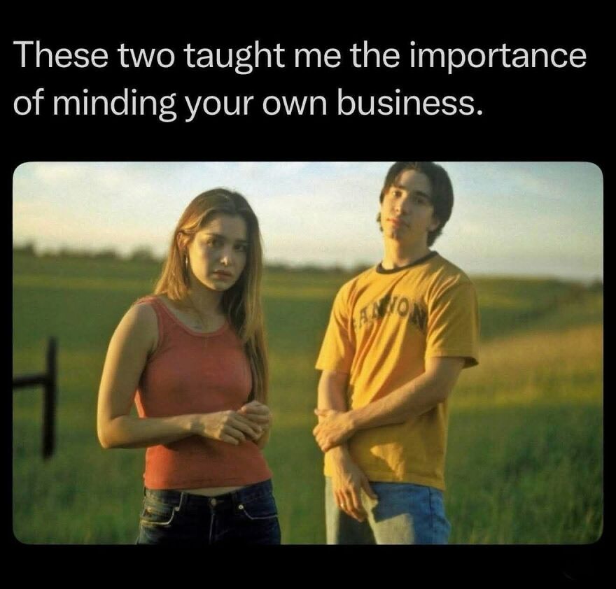 A scene from a movie featuring two young adults in a field, a classic memory for 90s babies.