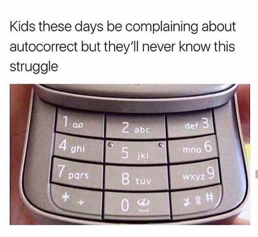 A close-up of an old flip phone keypad, representing a struggle '90s babies' might remember.