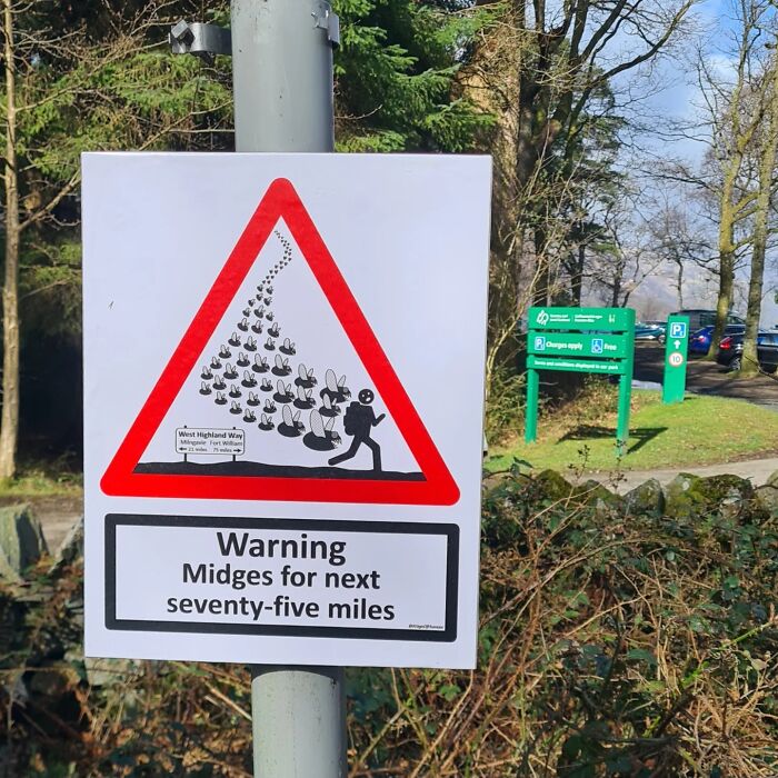 Absurd signs: A warning sign depicting a person chased by midges, for seventy-five miles.