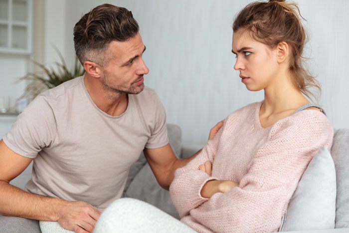 A man with autism diagnosis talking to his wife who changed her mind about having kids, showing devastation. A man with autism diagnosis talking to his wife who changed her mind about having kids, showing devastation.