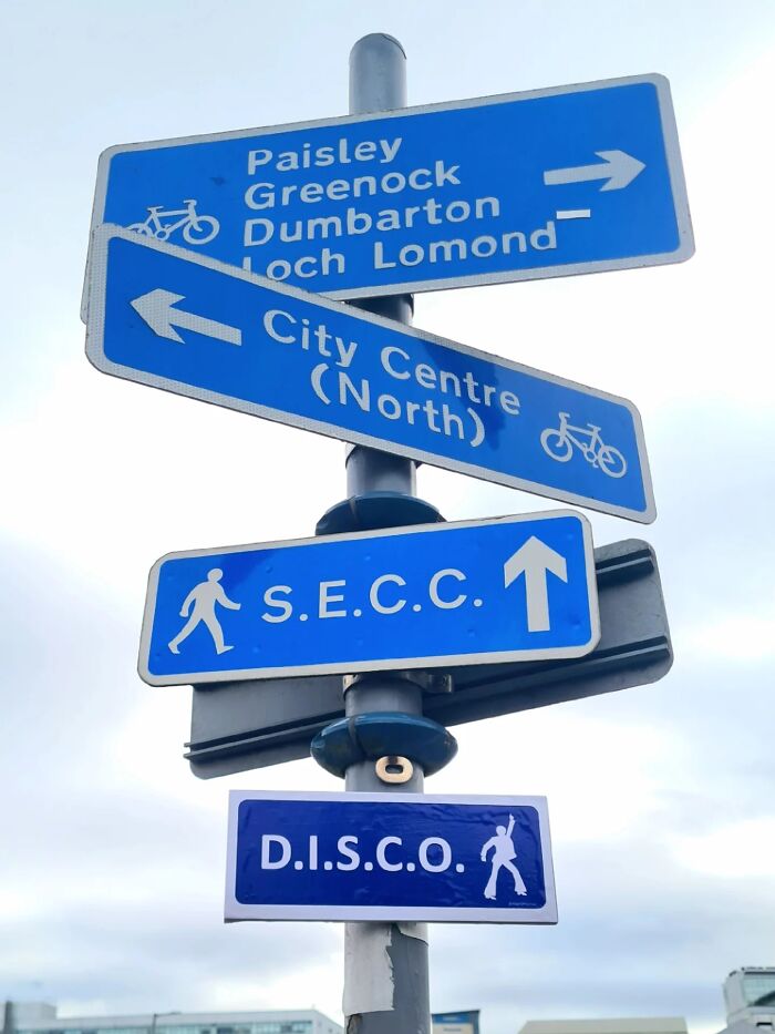 Absurd signs: A brilliant artist created a street sign pointing to D.I.S.C.O.