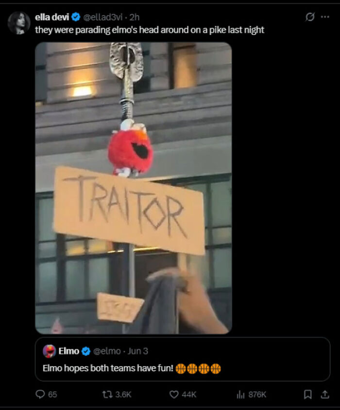 Funny and unpredictable sentences: A tweet showing Elmo's head on a pike with a 'TRAITOR' sign, referencing an earlier Elmo tweet.