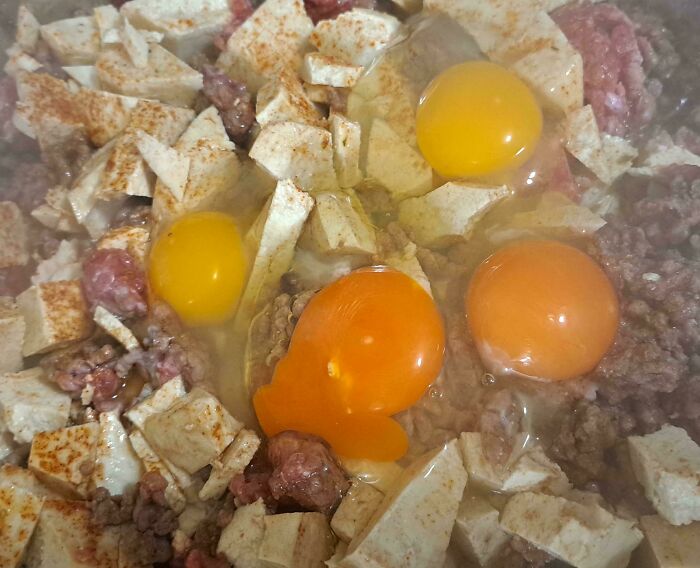 Before-and-after photo of ground meat, tofu, and raw eggs in a pan, showing how much things can change.