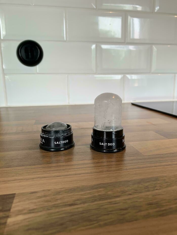 Before-and-after photos of a Salt Deo stick, showing a new full one next to a used, smaller one.