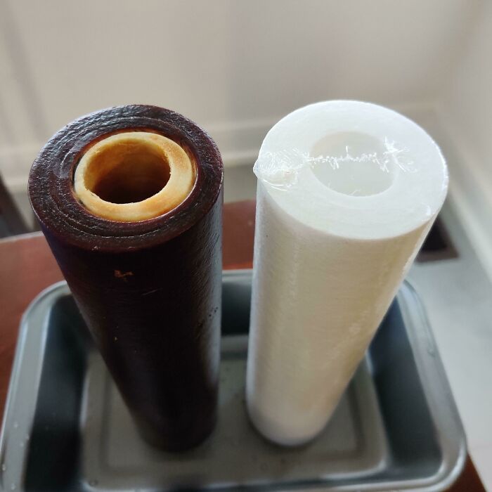 Before-and-after photo of a used dirty water filter next to a new clean one, showing how things can change.