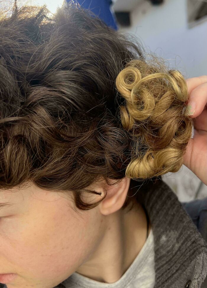 Before-and-after photo showing dark brown hair next to a bright blonde curl, illustrating how things can change.