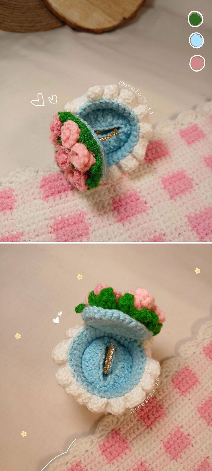 Incredible crochet enthusiasts' ring box with pink roses, holding a ring on a pink and white checkered background.