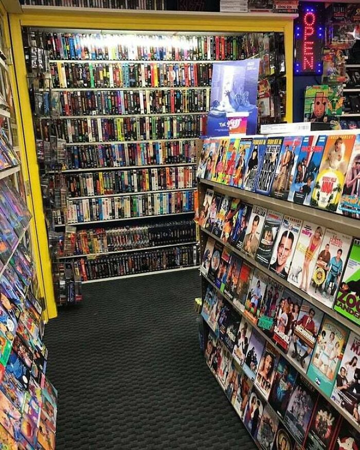 Curious facts about a video rental store with rows of movies, making you feel smarter with new pics.
