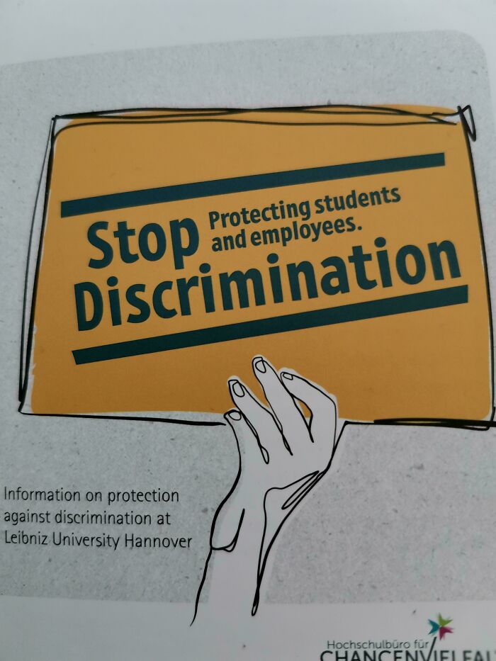 A flyer with an illustration of a hand holding a sign that reads Stop Protecting Students and Employees Discrimination, a design fail.