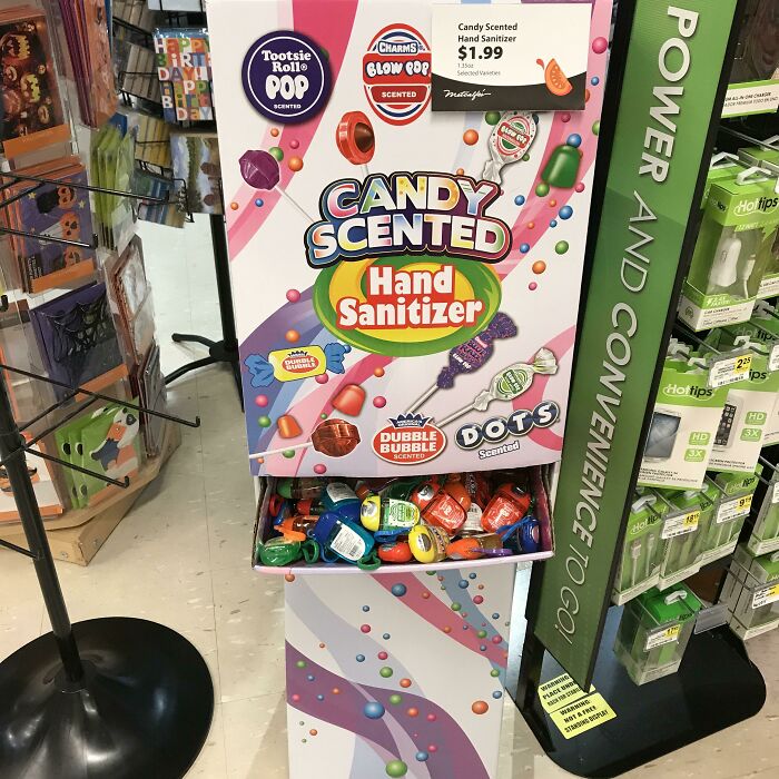 A candy scented hand sanitizer display with packaging that resembles real candy, showing designers failed to make clear distinctions.