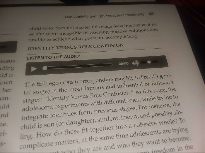 An open book with an audio player, where designers failed their job by not making the audio functional.