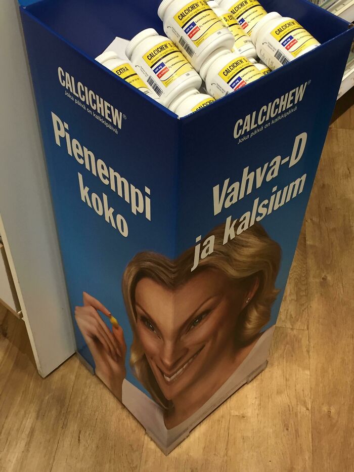 A display with a distorted image of a woman, an example of designers failing dismally with their job.