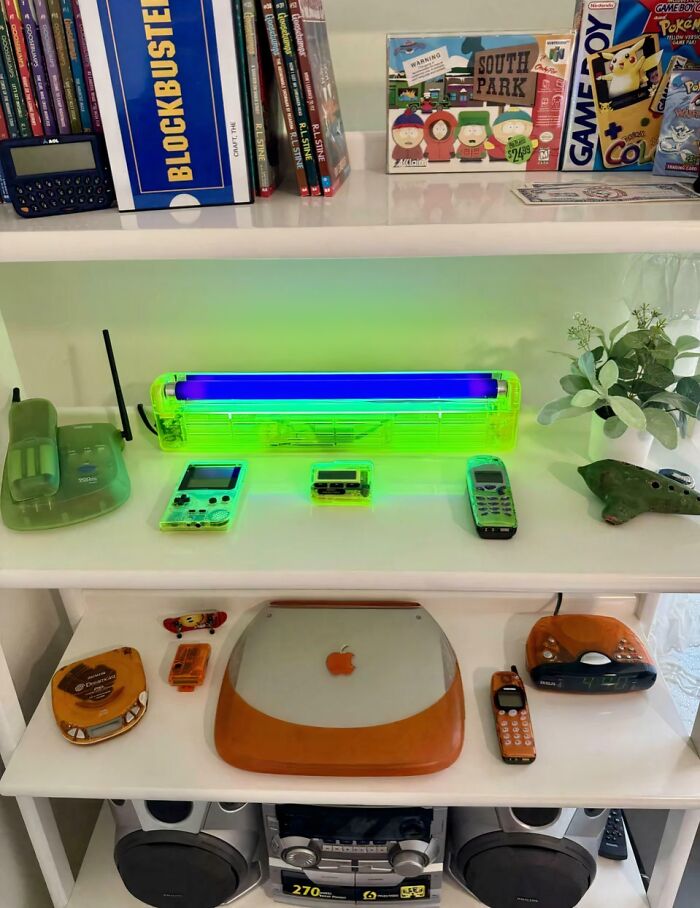 A shelf filled with 90s kids items like Blockbuster, Game Boy, and other throwback memes.