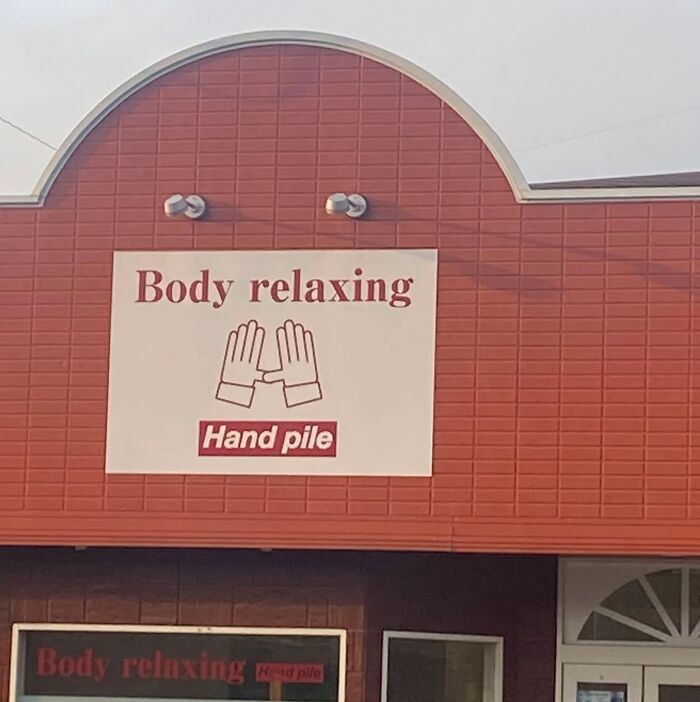 A sign in Japan with a hilarious example of getting lost in translation: Body relaxing, Hand pile.