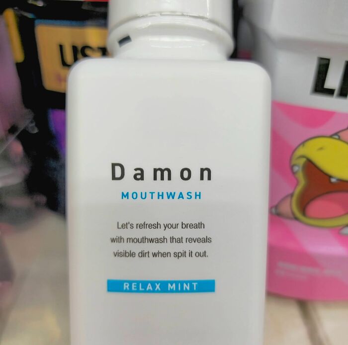 A bottle of mouthwash labeled Damon Mouthwash with the phrase Let's refresh your breath that reveals visible dirt when spit it out, a hilarious example of getting lost in translation.