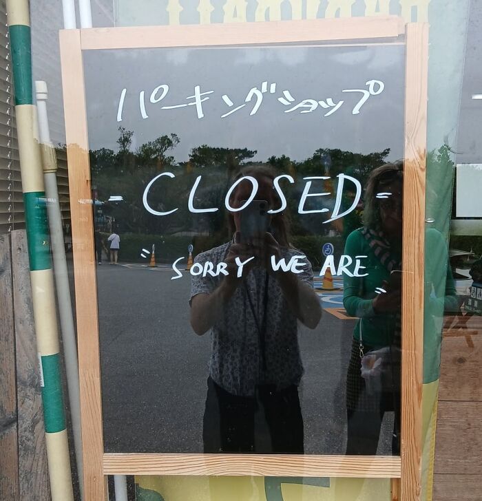 A whiteboard sign in Japan says CLOSED with Sorry We Are written below, a hilarious example of getting lost in translation.