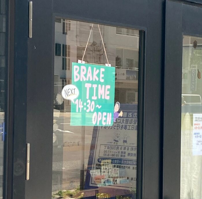 A sign on a glass door in Japan that says BRAKE TIME, a hilarious example of getting lost in translation.