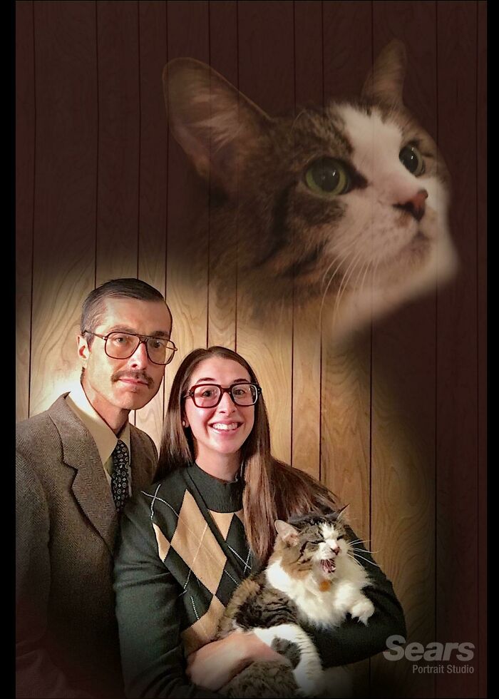 Funny animal photos: A couple with a yelling cat in a vintage portrait, with a cat head floating above them.