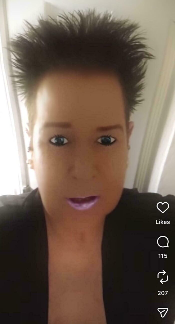 A person with exaggerated spiky hair and glowing eyes, a hilariously bad hair mistake, captured in a selfie.