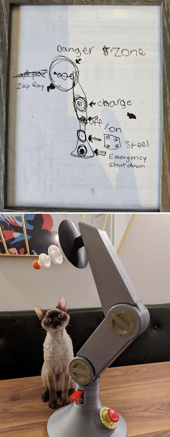 A Devon Rex cat sits next to a 3D printed robot arm, with the original robot drawing visible above, showcasing cool 3D printer projects.