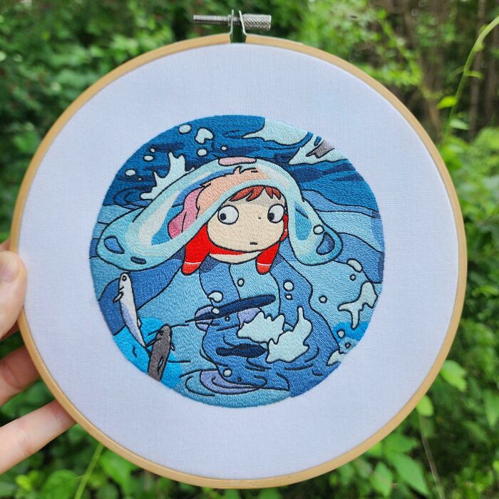 Beautiful embroidery projects hoop art depicting Ponyo underwater with waves and fish