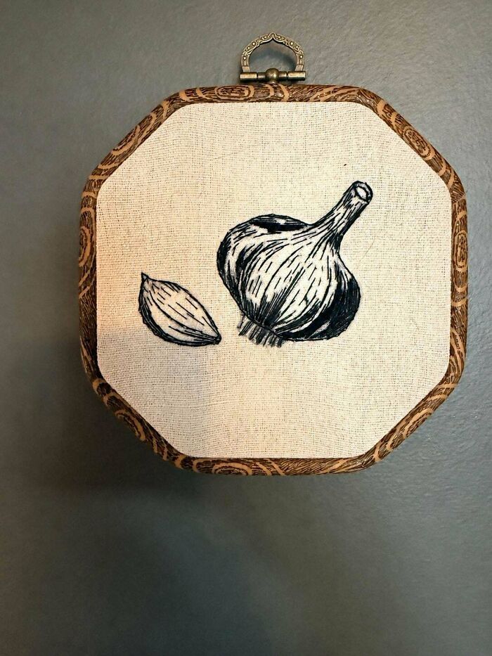 Minimalist black and white sketch style embroidery projects depicting garlic bulb and clove