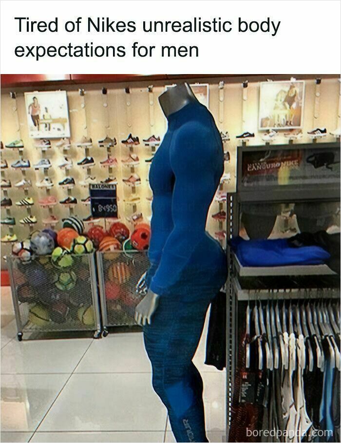 A funny meme of a highly muscular male mannequin in a Nike store, humorously critiquing unrealistic body expectations.