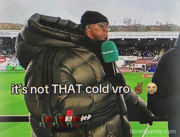 A reporter in a comically oversized puffy coat, holding a microphone. This image is a weird meme.