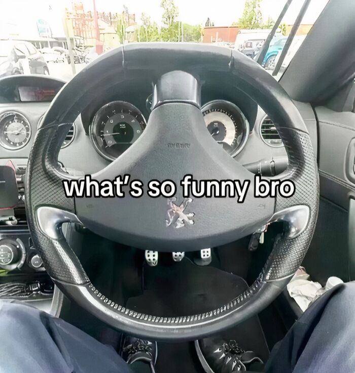 A cringe image showing a car steering wheel that resembles a face, with text asking what is so funny bro.