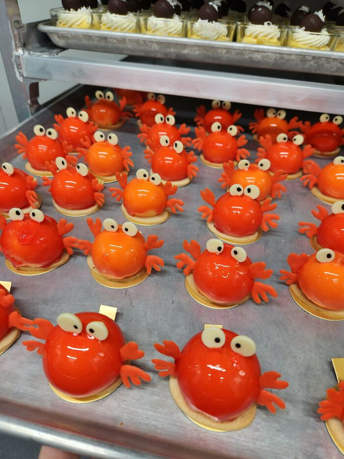 A tray of delightful crab-shaped treats, showcasing a baker's amazing and delicious creations.