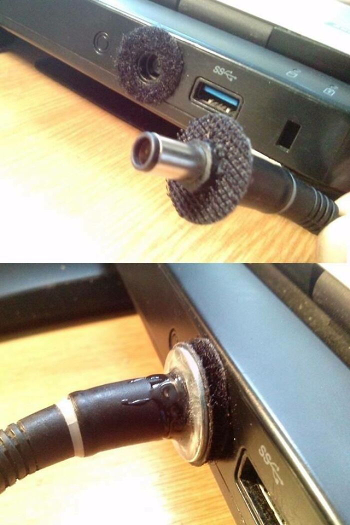 Wild and unhinged way to fix a laptop charging port with Velcro, securing the charger in place.