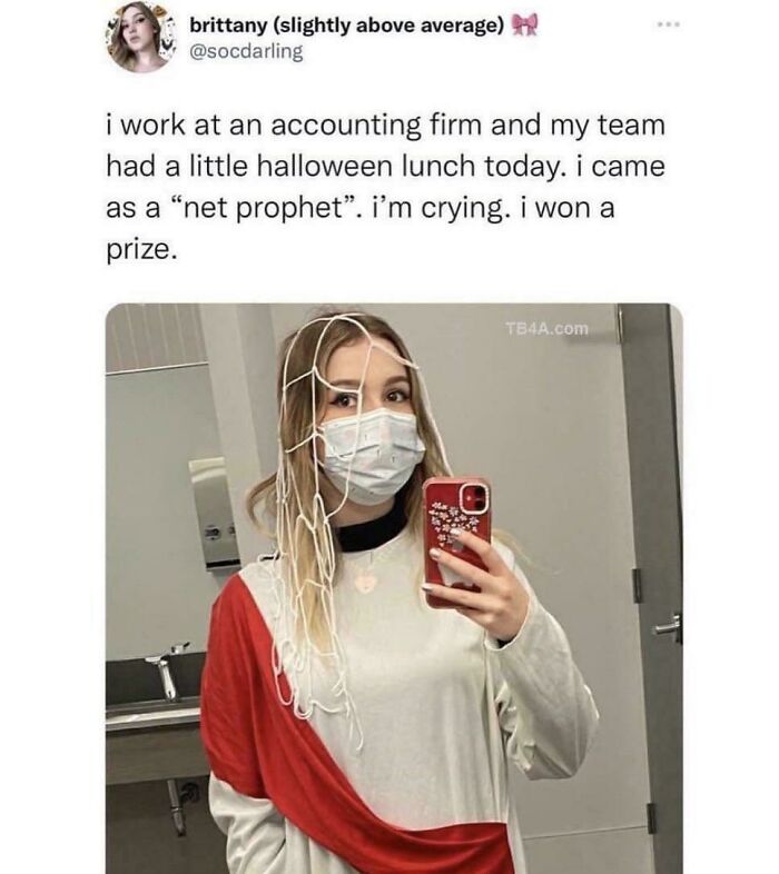 A woman dressed as a 'net prophet' for Halloween, a clever visual dumb pun.