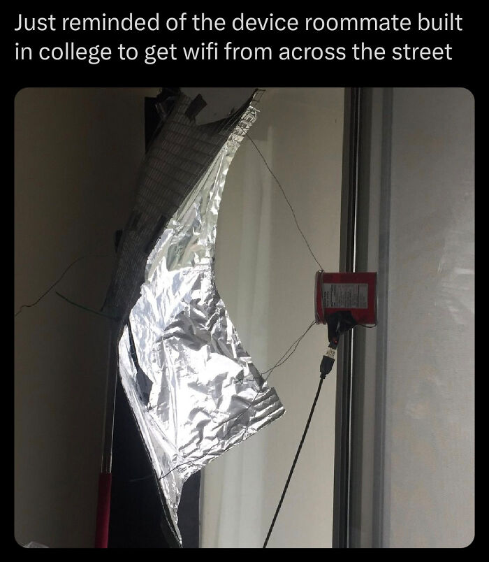A DIY device made of foil and a can to fix something by boosting wifi signal across the street.