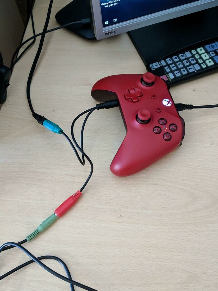 Wild and unhinged way to fix audio connections using a red Xbox controller.