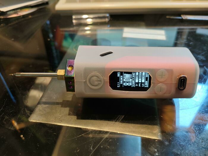 A wild and unhinged way to fix something, using a small, portable soldering iron with an 8.0W display.