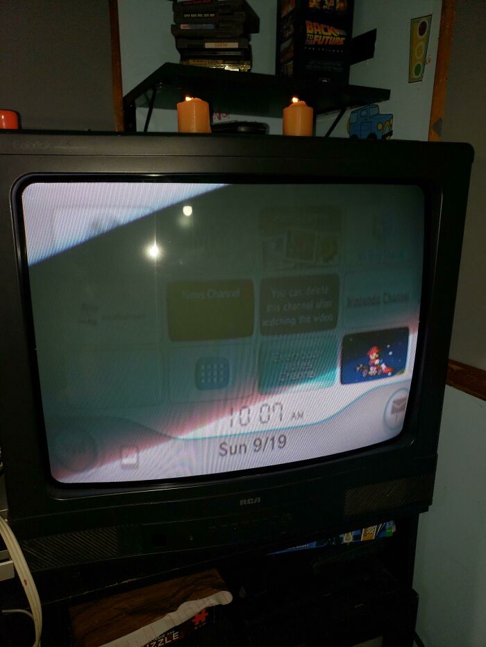 An old CRT television displays a faint menu, a wild way to fix something with an outdated device.