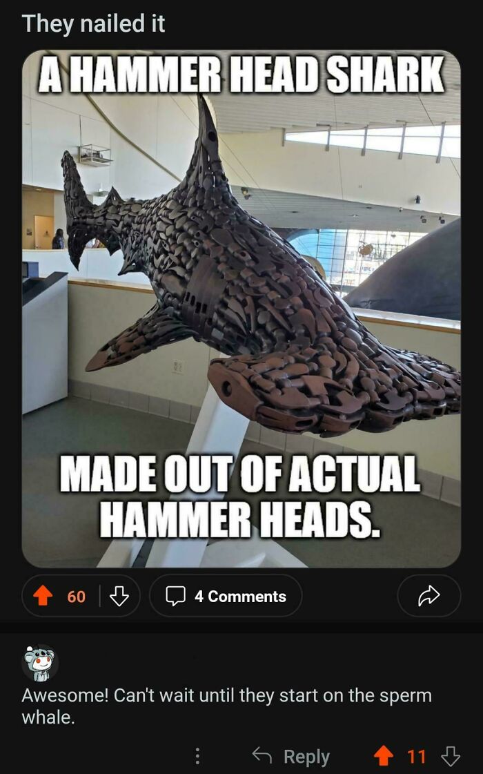 Funny and savage comments section about a hammerhead shark sculpture, showing great examples of checking the comments section.