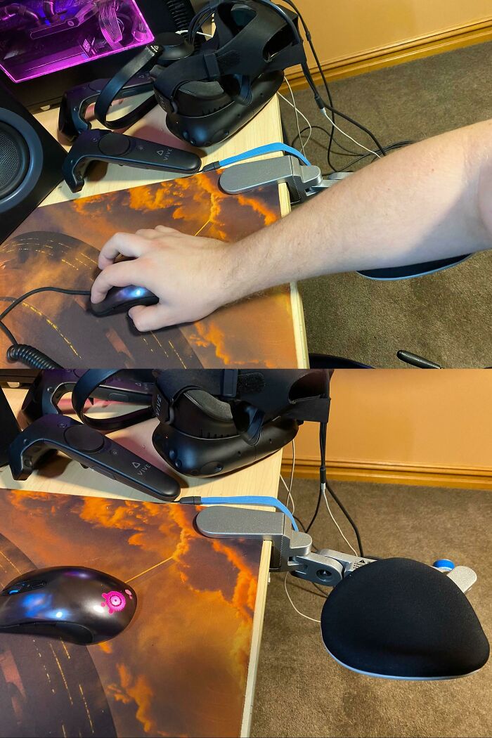 A hand on a computer mouse next to VR equipment, using an arm rest as a wild way to fix wrist discomfort.