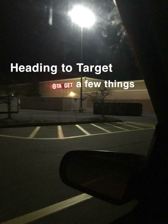 A car view of a Target store at night, with a burnt-out letter making a dumb pun: 'OTA GET a few things'.
