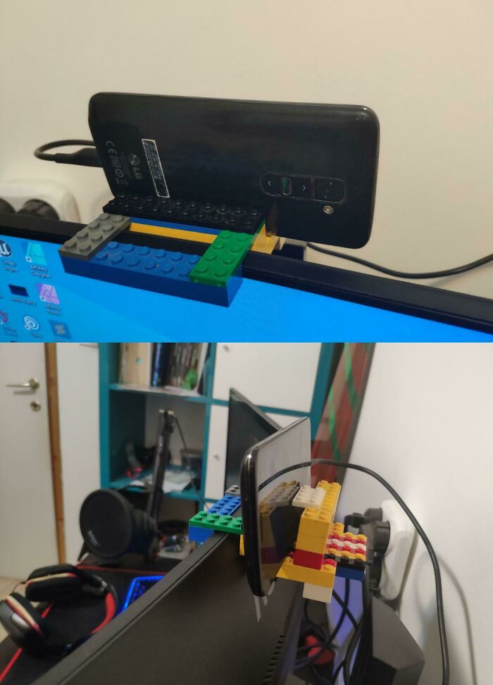 Wild and unhinged way to fix a phone mount using colorful Lego bricks attached to a computer monitor.