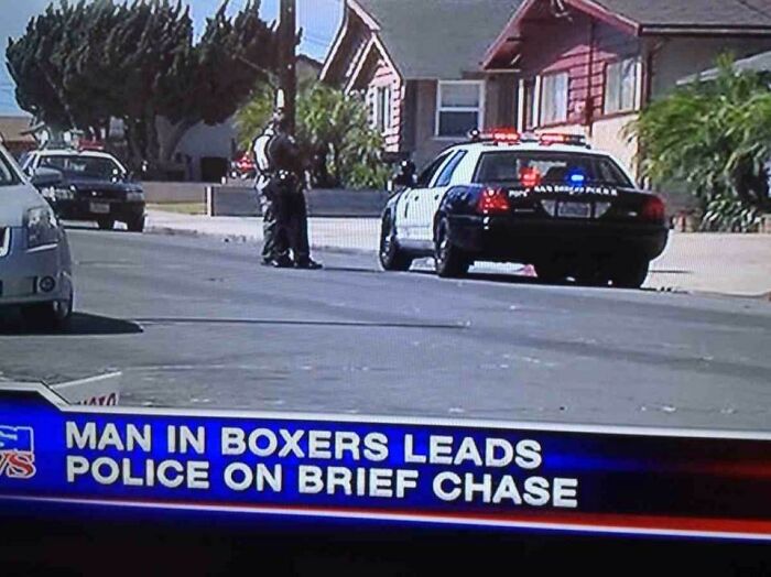A TV screen showing a news headline about a man in boxers leading police on a brief chase, an incredibly dumb pun.