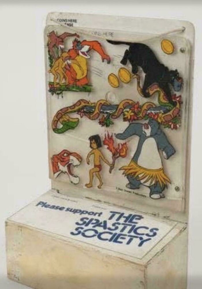 A vintage Jungle Book display with Baloo and Mowgli, evoking good memories of life in the 80s.