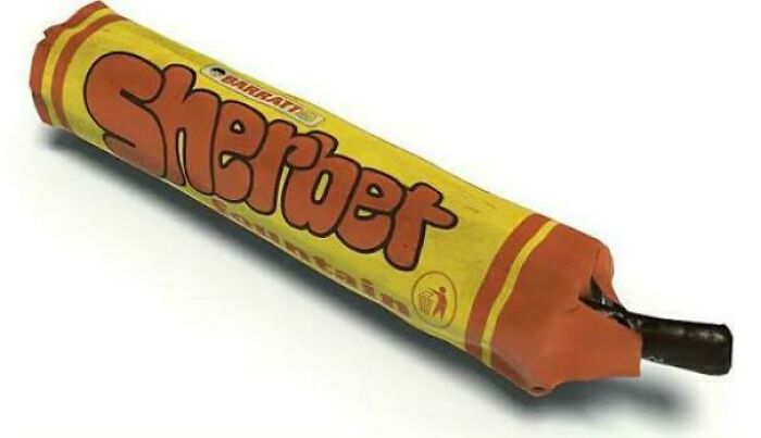 A classic yellow and orange Barratt Sherbet Fountain sweet, evoking good memories of life in the 80s.