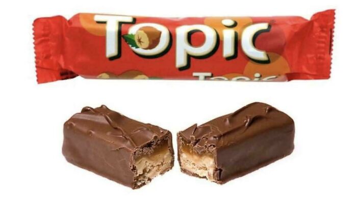 A Topic chocolate bar wrapper and the bar broken in half, a classic sweet from the 80s.