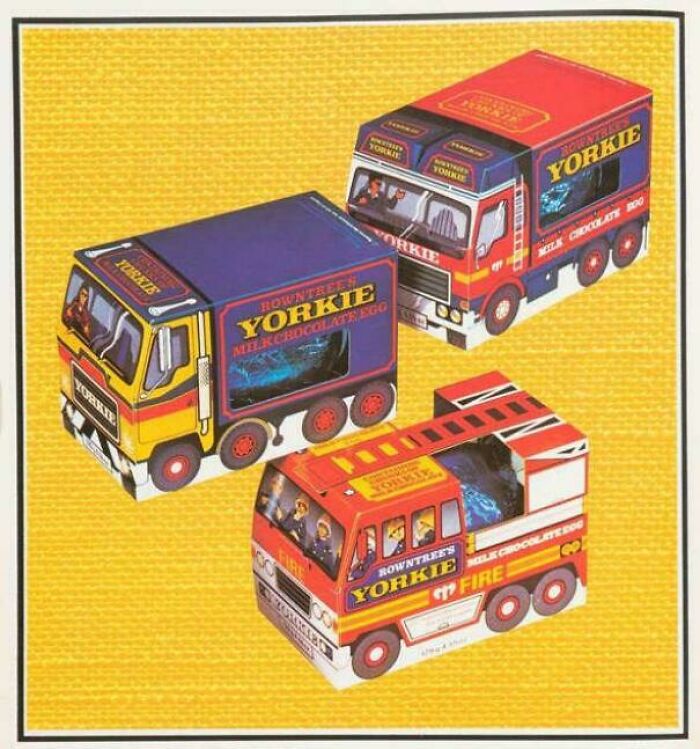 Three Rowntrees Yorkie chocolate egg trucks, a popular treat from the 80s, bringing back good memories.