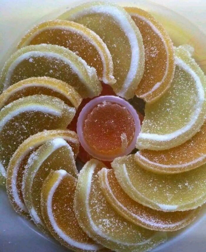 A close-up of sugary jelly candies arranged in a circle, bringing back good memories of life in the 80s.