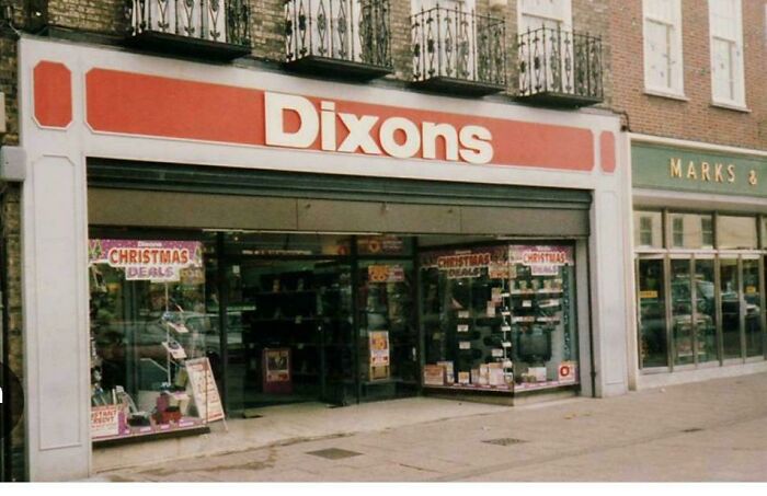 A Dixons electronics store front from the 80s, evoking good memories of life.