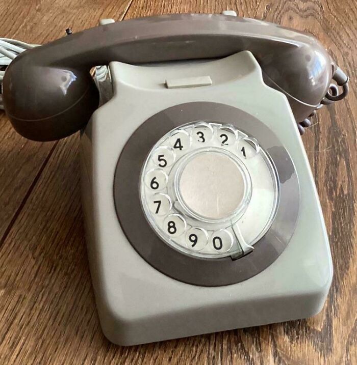 A vintage rotary telephone, a classic item from life in the '80s.