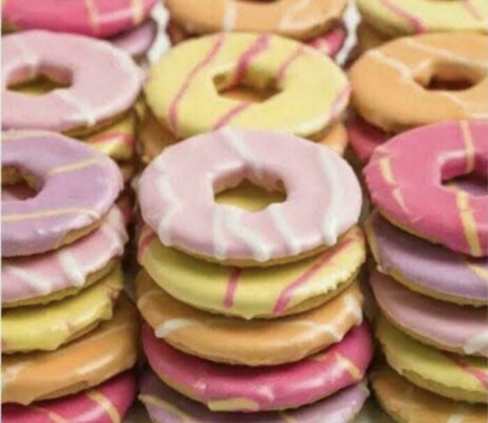 A pile of colorful iced donuts, bringing back good memories of life in the '80s.
